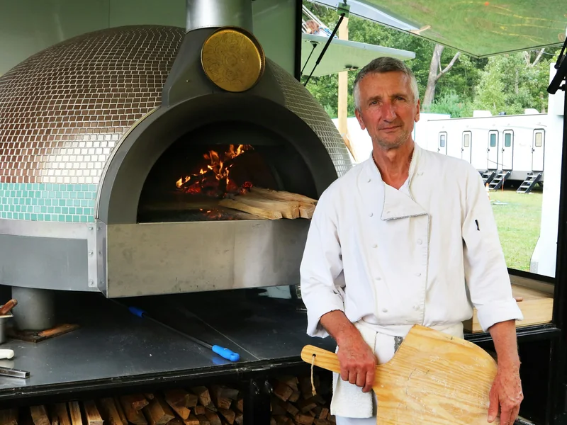 Chef-guided cooking session in an open kitchen